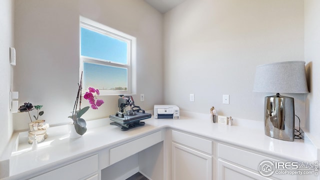 kitchen featuring white cabinets and light countertops