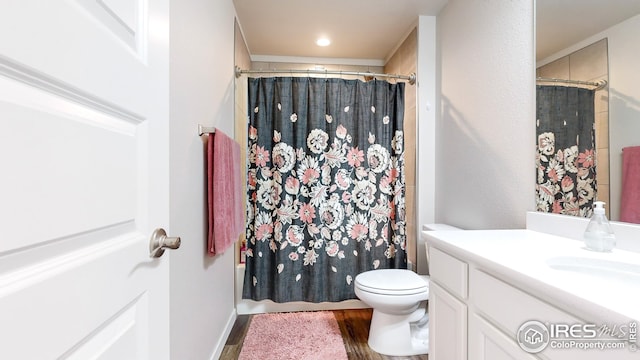 full bath featuring toilet, wood finished floors, vanity, and a shower with curtain