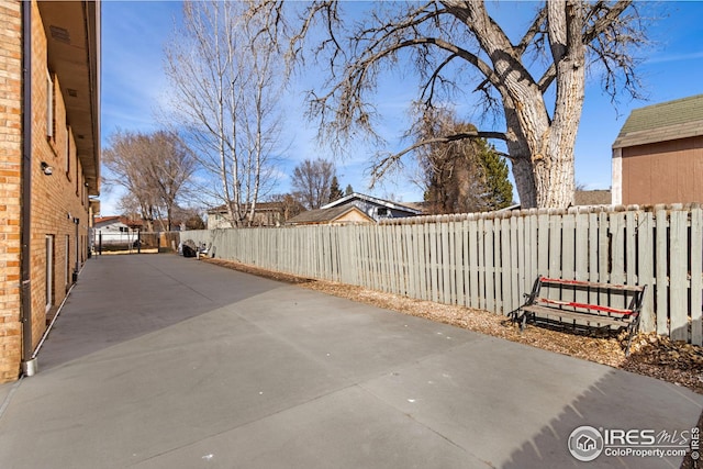 view of patio with a fenced backyard