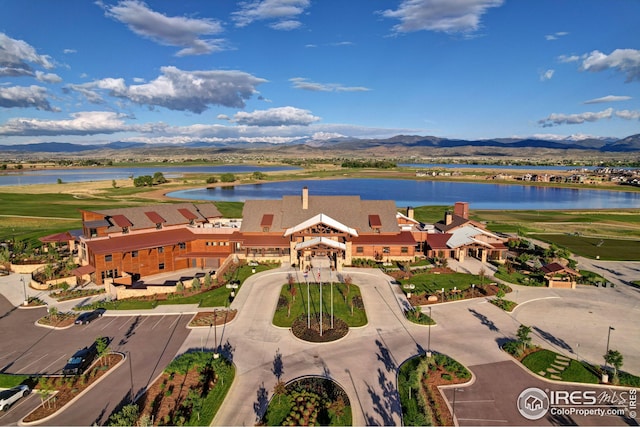 bird's eye view with a water and mountain view