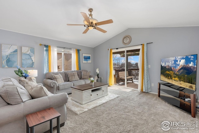 carpeted living area featuring ceiling fan and vaulted ceiling