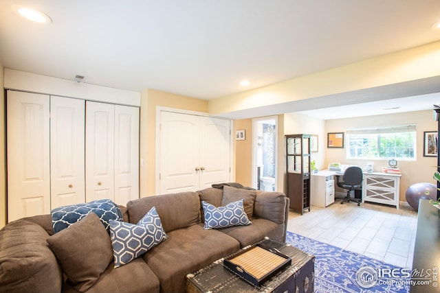 living area featuring recessed lighting