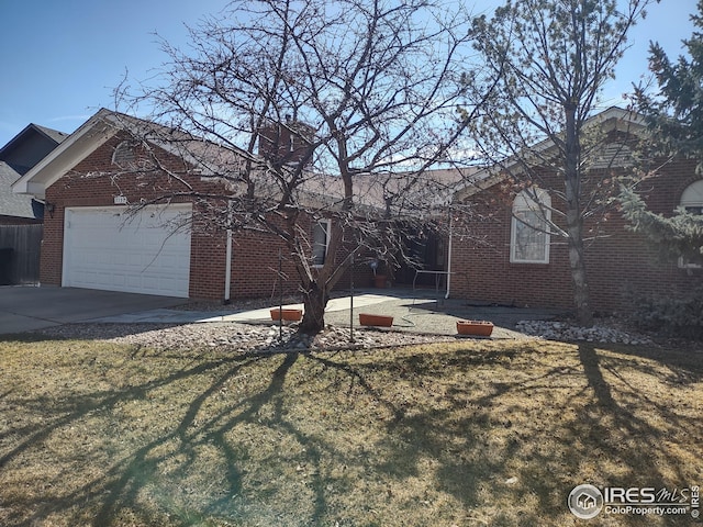 ranch-style house with a front lawn, brick siding, driveway, and an attached garage