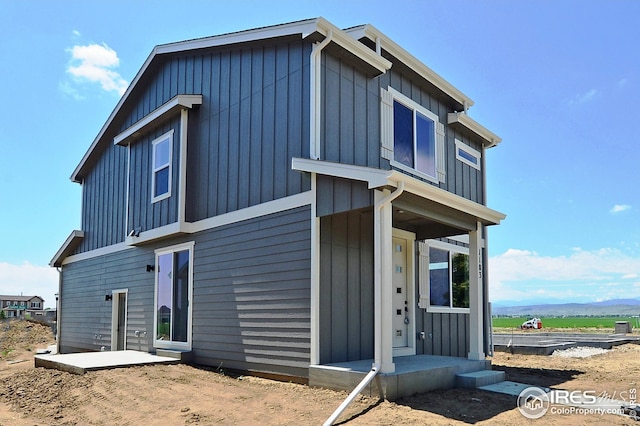 view of front facade with board and batten siding