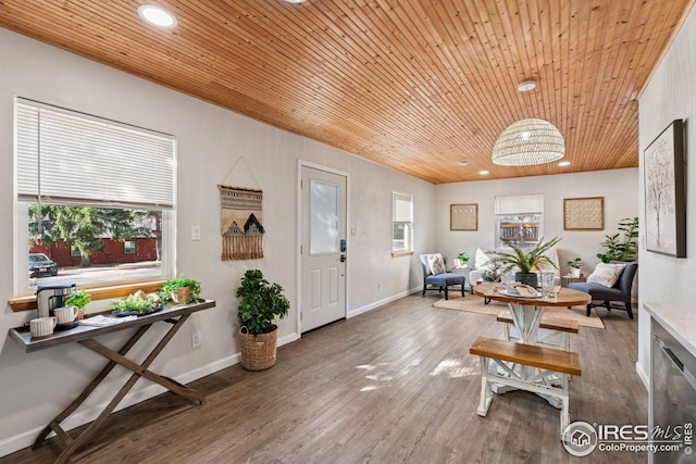 foyer entrance featuring recessed lighting, wood ceiling, and wood finished floors