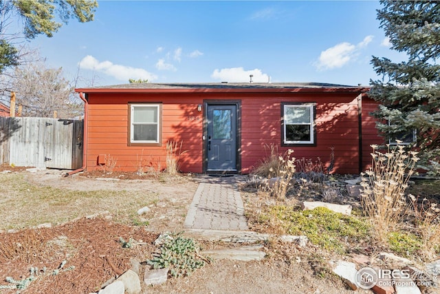 view of front of home with fence