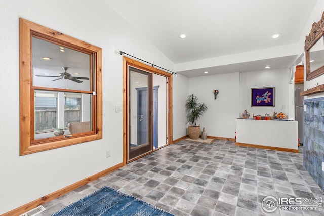 entrance foyer with ceiling fan, baseboards, vaulted ceiling, and recessed lighting