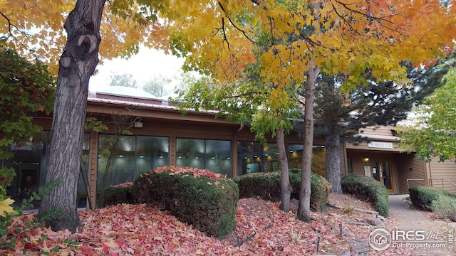 exterior space with metal roof