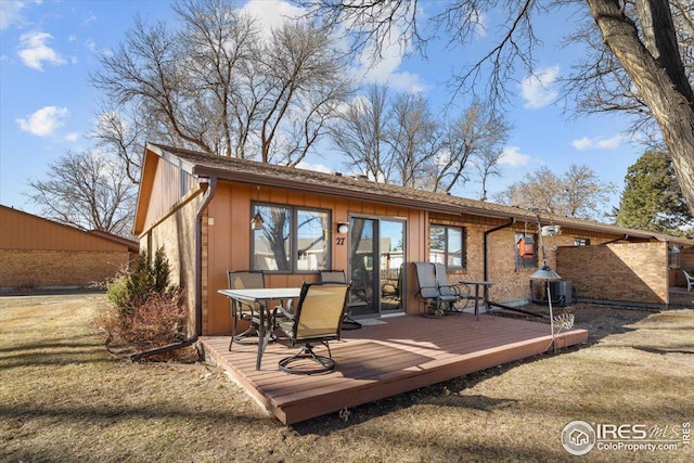 rear view of house with a deck