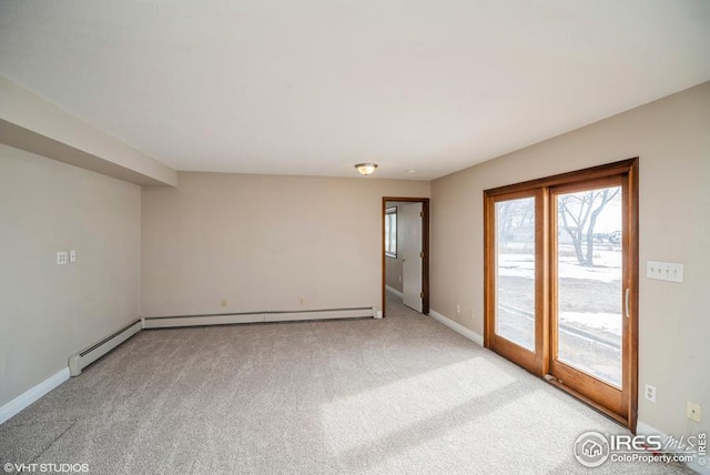 unfurnished room with carpet floors and baseboards