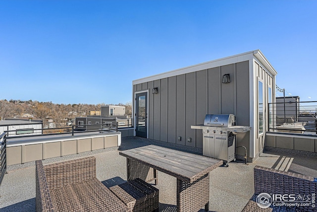 view of patio / terrace featuring grilling area and a balcony