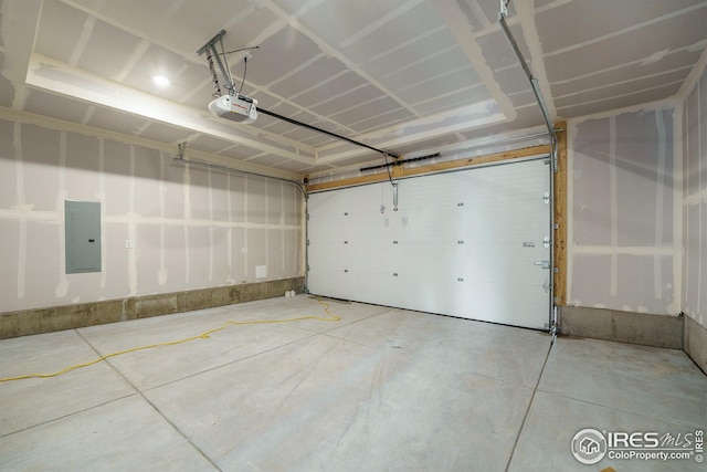 garage with electric panel and a garage door opener