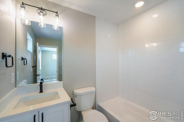 full bath featuring shower / bath combination, vanity, and toilet