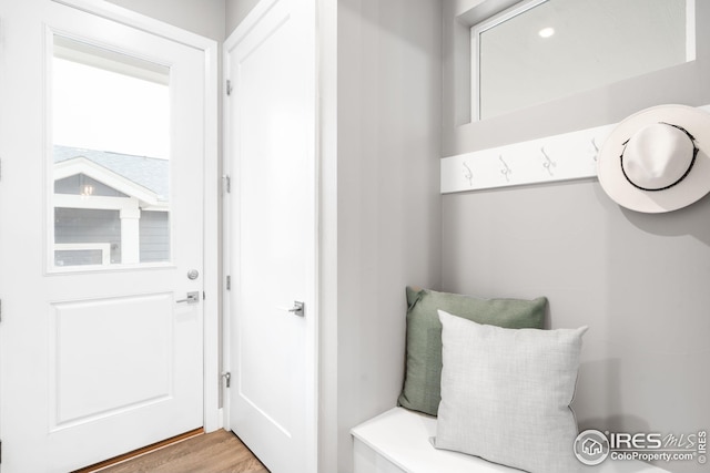 mudroom with wood finished floors