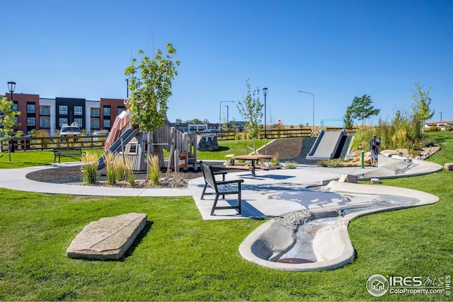 view of jungle gym with a yard