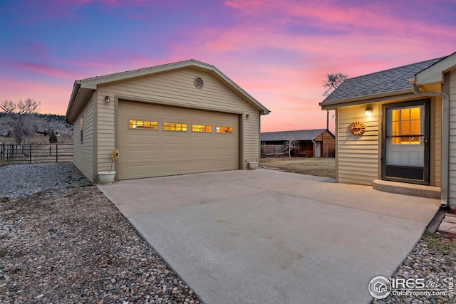 detached garage with fence