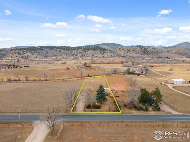 bird's eye view with a rural view and a mountain view