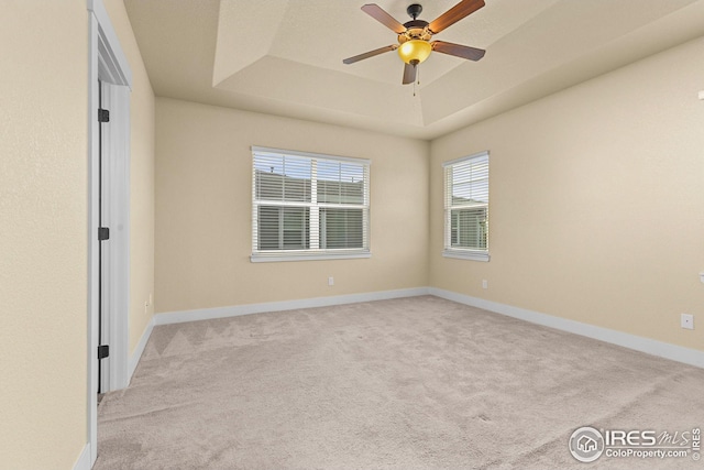 5850 Dripping Rock Ln, Fort Collins, CO 80528 - spare room with carpet floors, a tray ceiling, and baseboards
