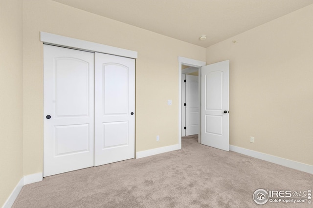 5850 Dripping Rock Ln, Fort Collins, CO 80528 - unfurnished bedroom with carpet floors, baseboards, and a closet