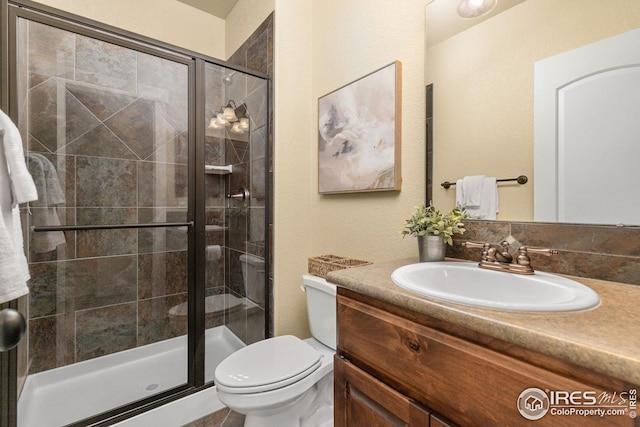 5850 Dripping Rock Ln, Fort Collins, CO 80528 - full bath featuring a shower stall, toilet, and vanity