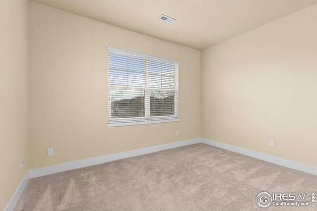 5850 Dripping Rock Ln, Fort Collins, CO 80528 - unfurnished room featuring carpet flooring, visible vents, and baseboards