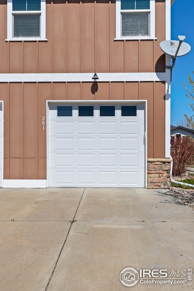5850 Dripping Rock Ln, Fort Collins, CO 80528 - garage with concrete driveway