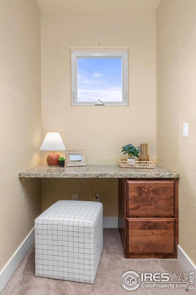 5850 Dripping Rock Ln, Fort Collins, CO 80528 - carpeted office featuring baseboards and built in study area