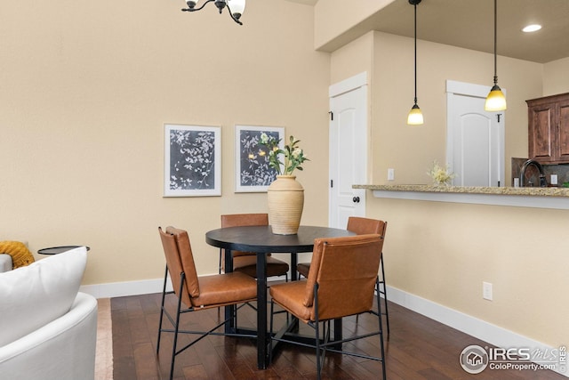 5850 Dripping Rock Ln, Fort Collins, CO 80528 - dining space with dark wood-style floors, baseboards, and recessed lighting
