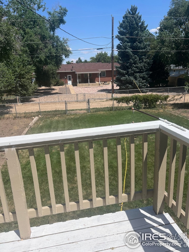 deck with fence private yard and a yard