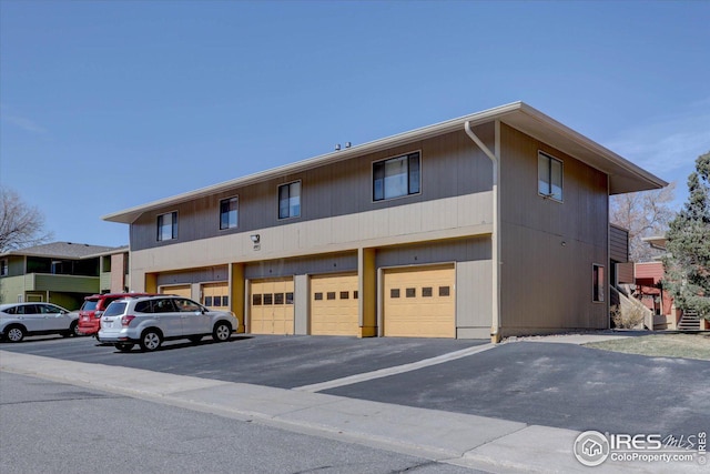 1105 Bacchus Dr Unit 8, Lafayette, CO 80026 - townhome / multi-family property with an attached garage