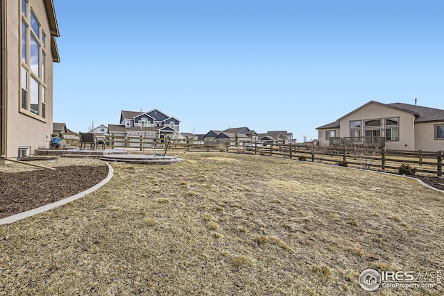 5541 Tullamore Ct, Timnath, CO 80547 - view of yard with fence and a residential view