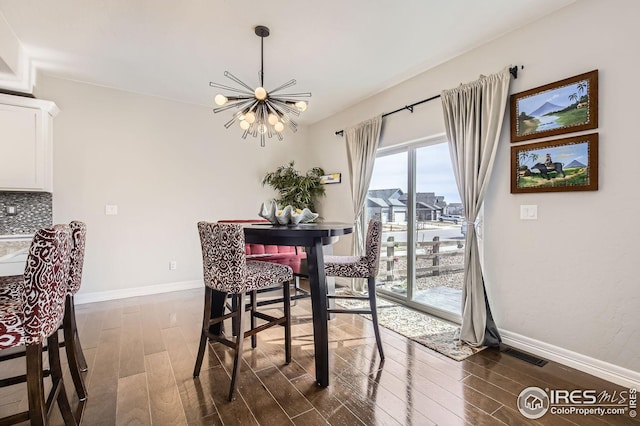 5541 Tullamore Ct, Timnath, CO 80547 - dining space with a chandelier, dark wood finished floors, and baseboards