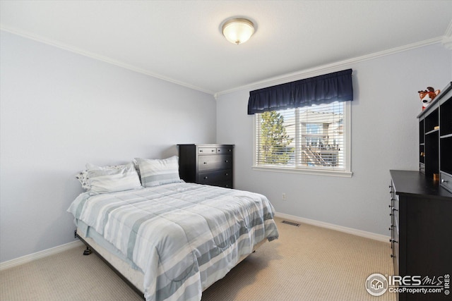 bedroom with visible vents, baseboards, and carpet floors