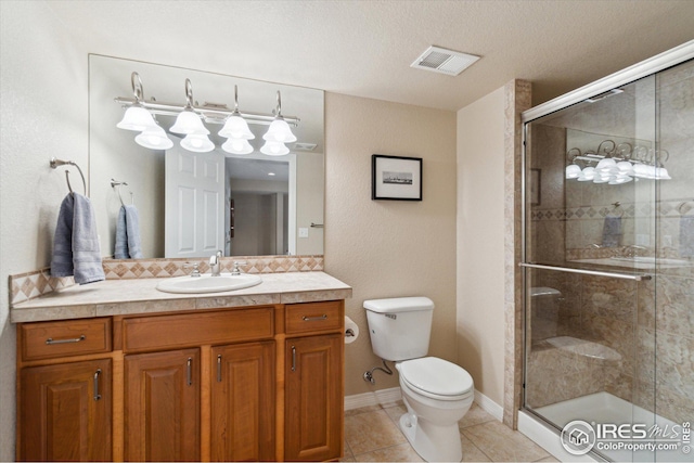 full bath featuring tile patterned floors, visible vents, a shower stall, and toilet