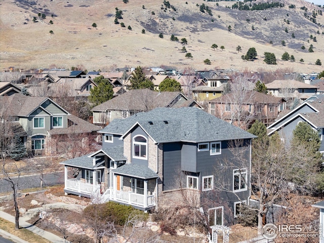 drone / aerial view with a residential view