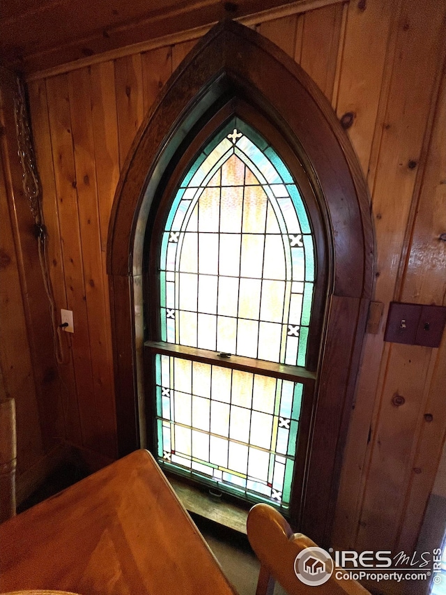 room details featuring wood walls