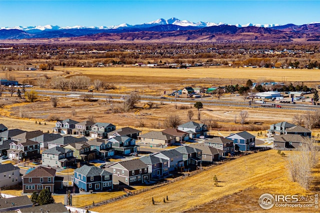 birds eye view of property featuring a residential view and a mountain view