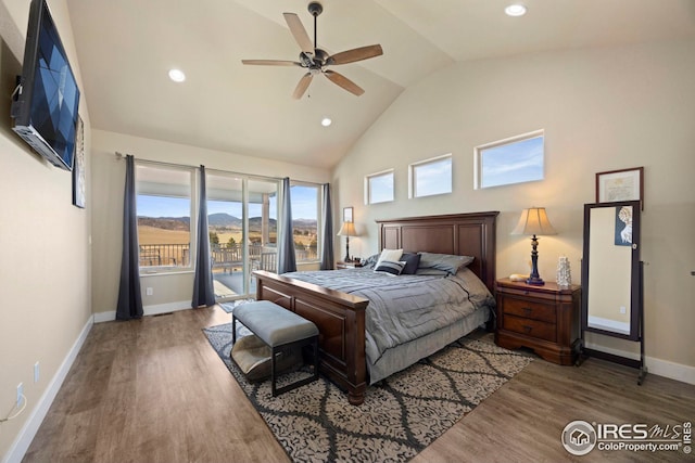 bedroom featuring recessed lighting, baseboards, high vaulted ceiling, and wood finished floors