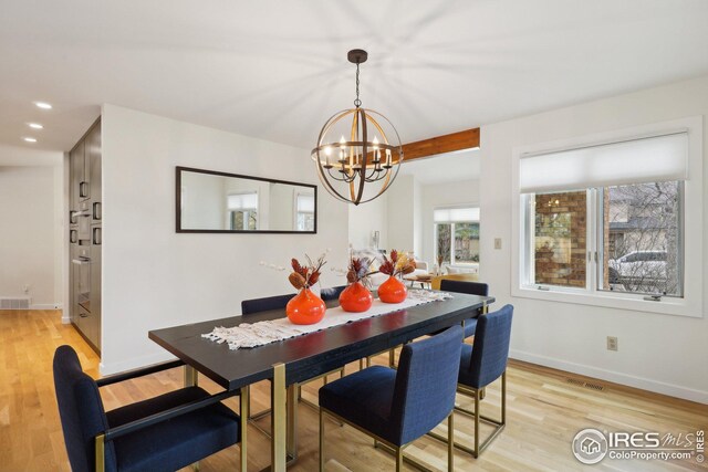 dining space featuring visible vents, baseboards, a chandelier, light wood-type flooring, and recessed lighting