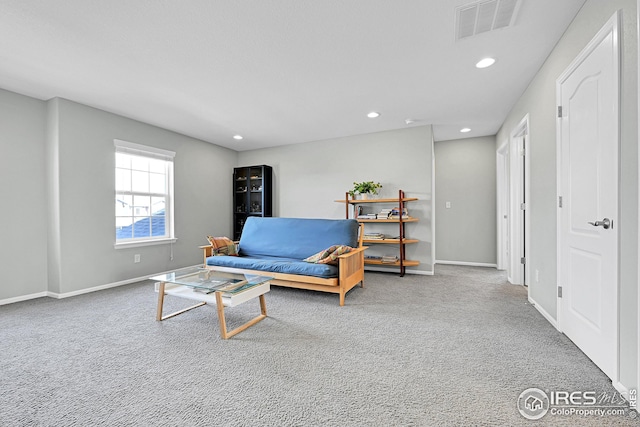 sitting room with recessed lighting, visible vents, carpet flooring, and baseboards