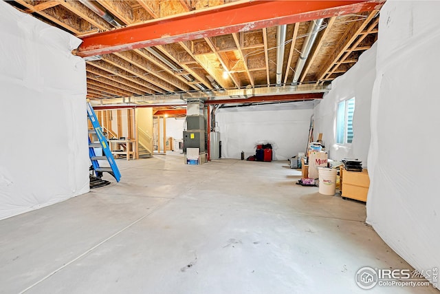 basement featuring heating unit