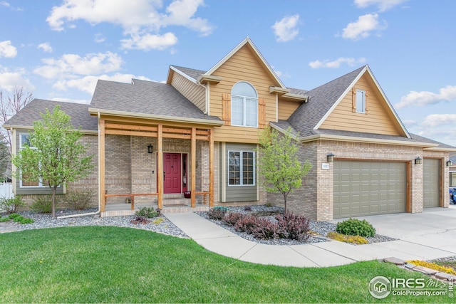 traditional-style home featuring brick siding, driveway, a front lawn, and roof with shingles