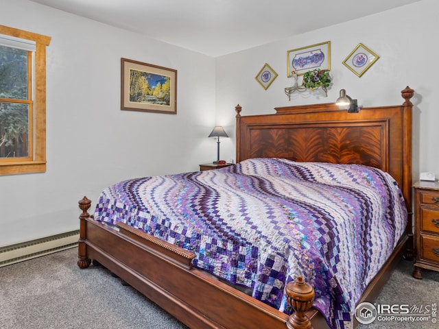 carpeted bedroom with baseboard heating