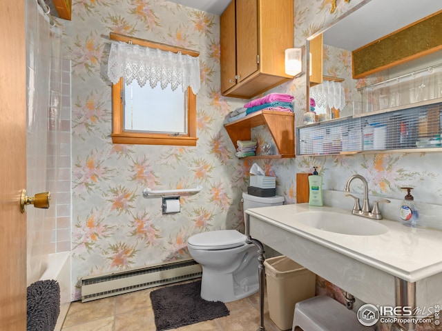 full bathroom featuring a baseboard radiator, wallpapered walls, a sink, tile patterned flooring, and toilet