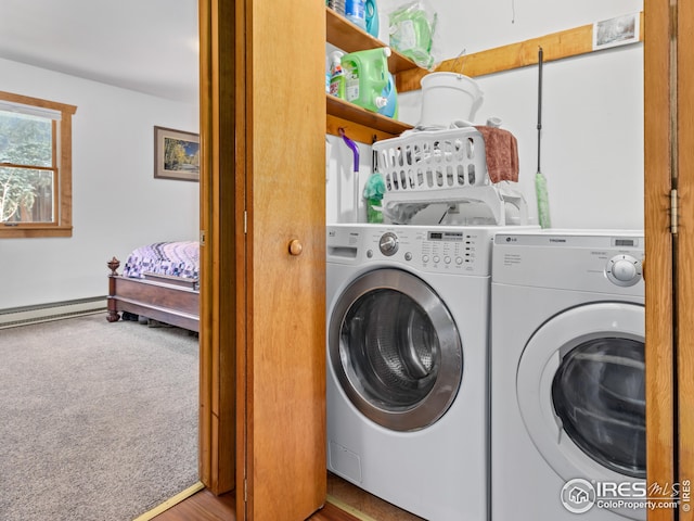 washroom featuring laundry area, washer and dryer, carpet flooring, and a baseboard radiator