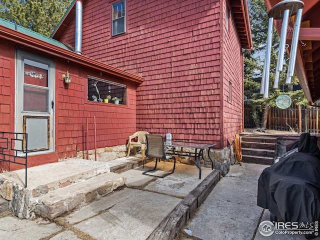 view of patio / terrace with fence