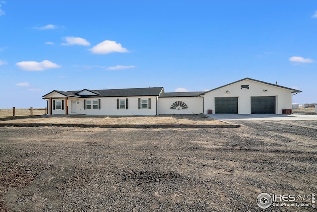 view of front of home featuring a garage and concrete driveway