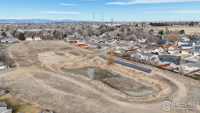 bird's eye view featuring a residential view and a mountain view