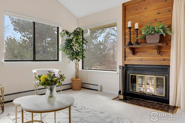 sitting room featuring a fireplace, vaulted ceiling, carpet, and baseboards