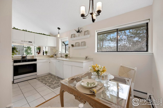 kitchen featuring under cabinet range hood, white appliances, white cabinetry, and a sink